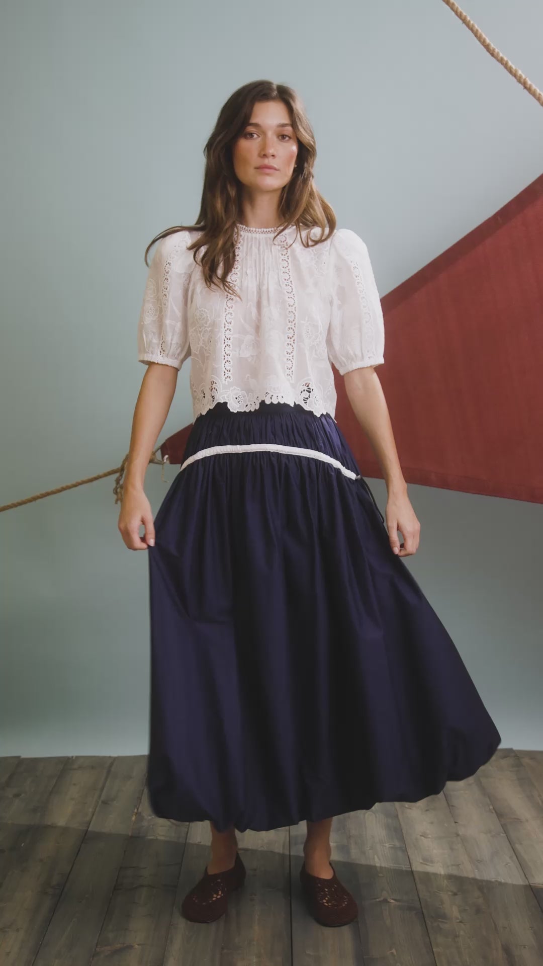 The Ouisie Top paired with Allegra Skirt in Deep Sea. 
