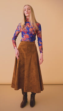 The Ida Skirt is made of 100% suede, fitted at the waist, relaxed at the hips with a full skirt.