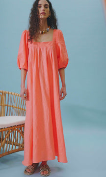 The Waverly maxi dress has a square neckline, elbow length balloon sleeves and pleats at the bodice.