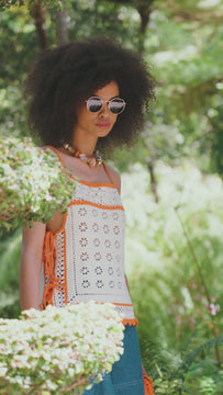 These denim shorts have slant front pockets, back pockets, an elastic waist and special buttons.