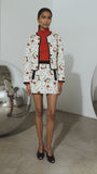 The Atwood Jacket in Camellia Ivory paired with the matching India Skirt and the Roen Turtleneck. 