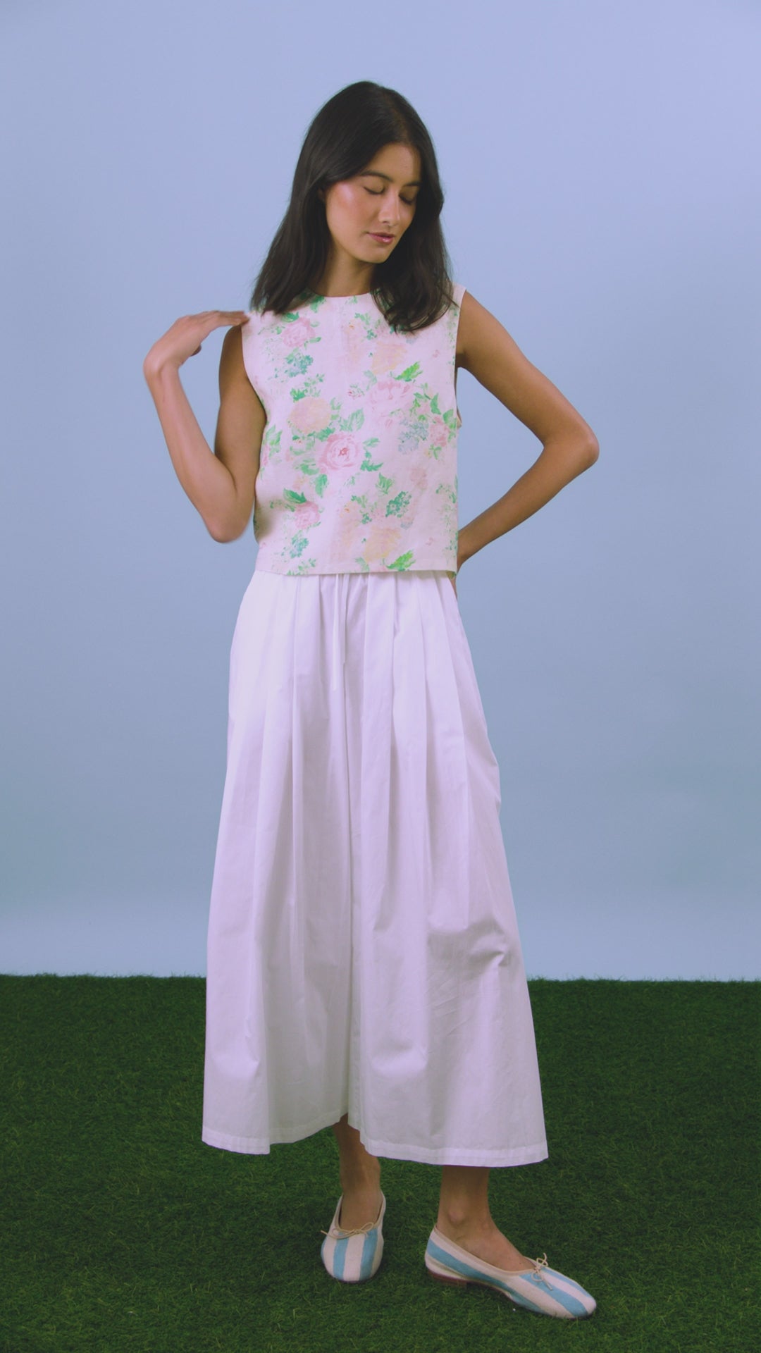 The Manning Top in Garden Rose Peony paired with white Whisper Pants.