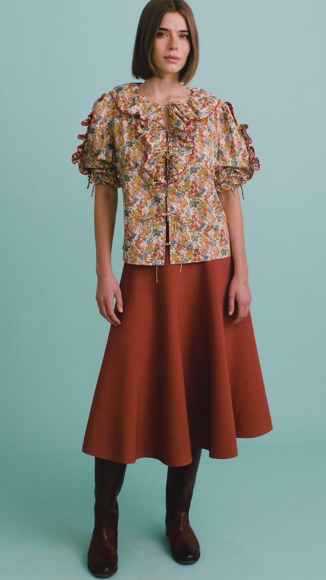 The Marigold Top in Gertrude paired with the Joan Skirt in Rust. 