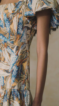 The Cassidy puff sleeve midi dress has a square neckline, a fitted bodice and an a-line skirt.