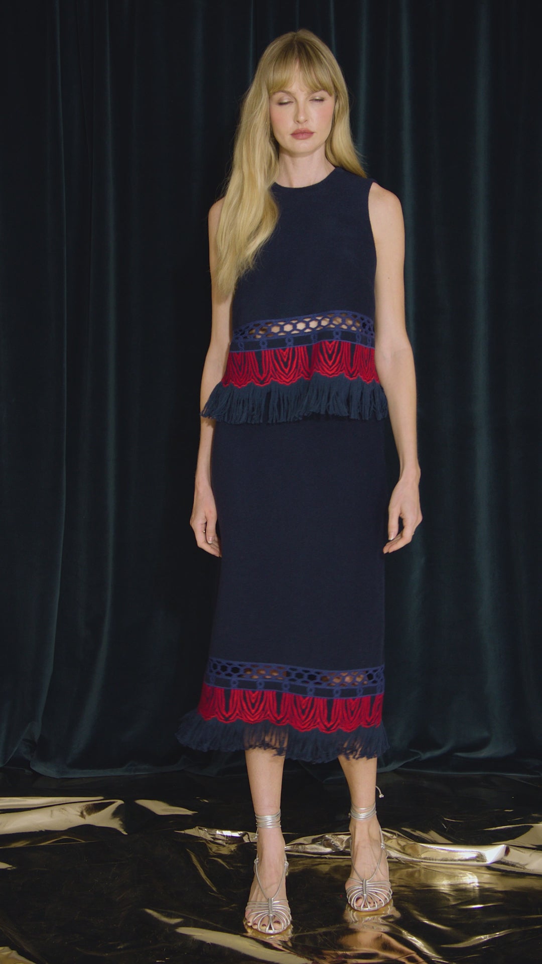 The Rivington Skirt is a midi in embroidered fringe wool, a clean finished waist and back zipper
