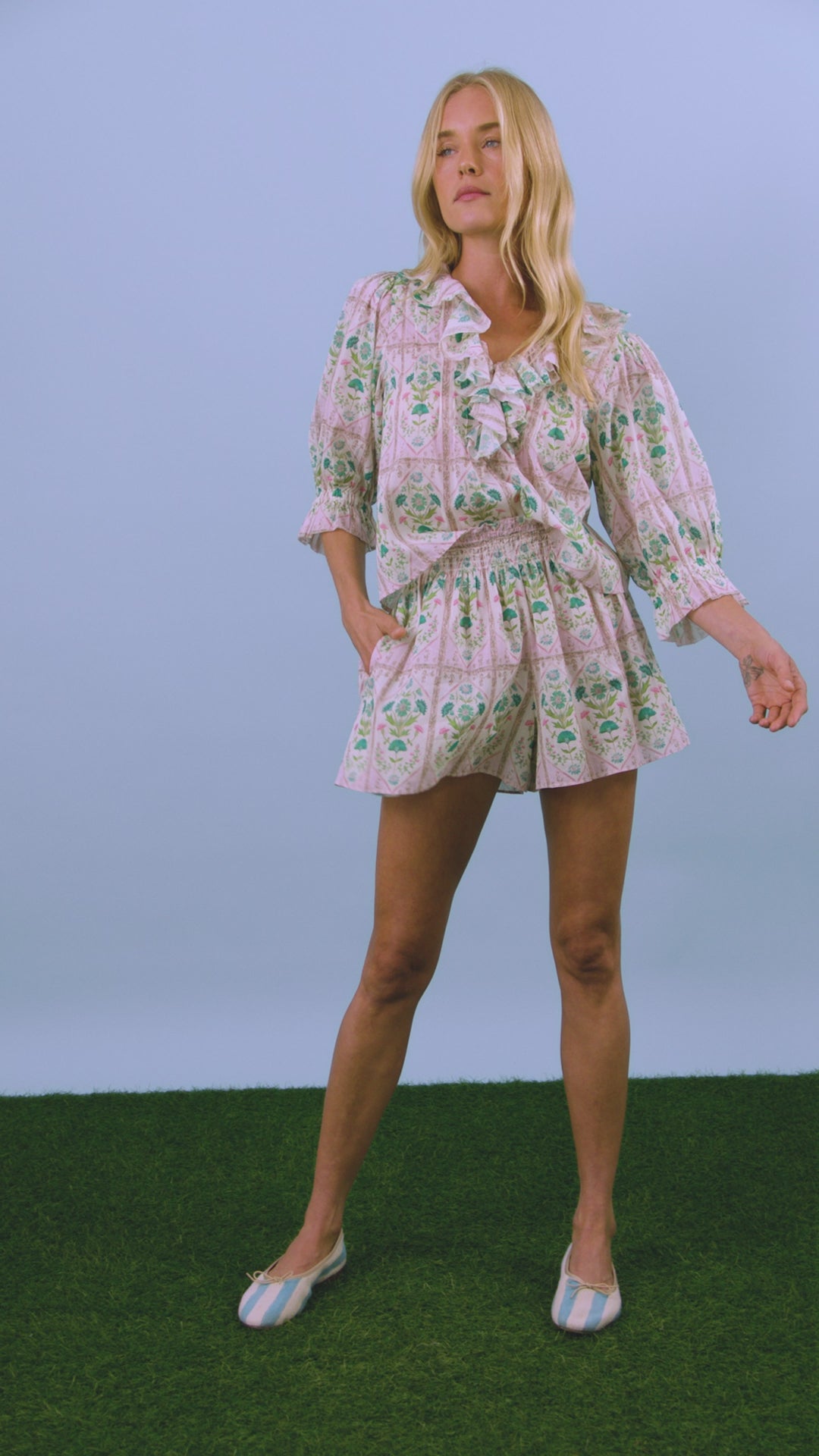 The Imogen Blouse, cotton voile ruffle blouse, in Pink Trellis paired with matching Jemma Shorts.