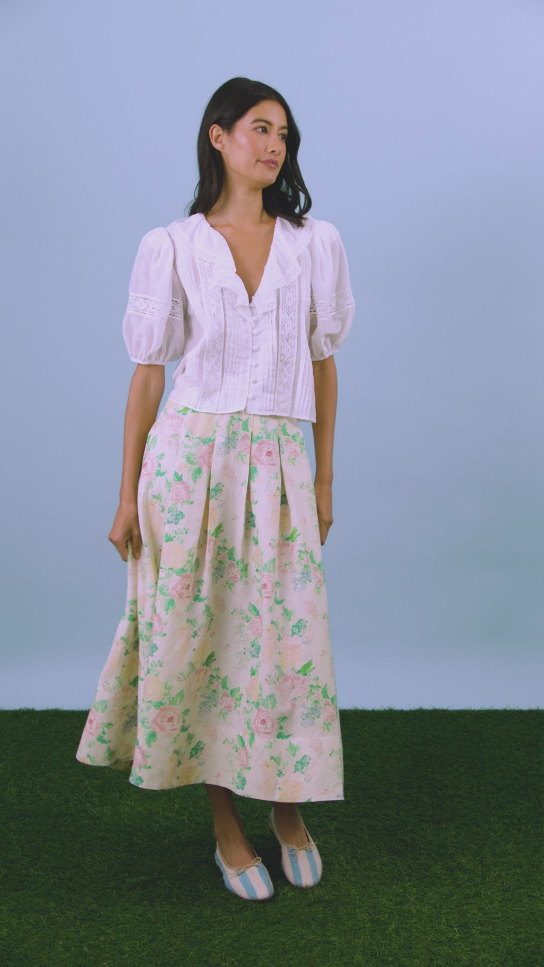 The Alexis Skirt in Garden Rose Peony paired with white Mare Top.