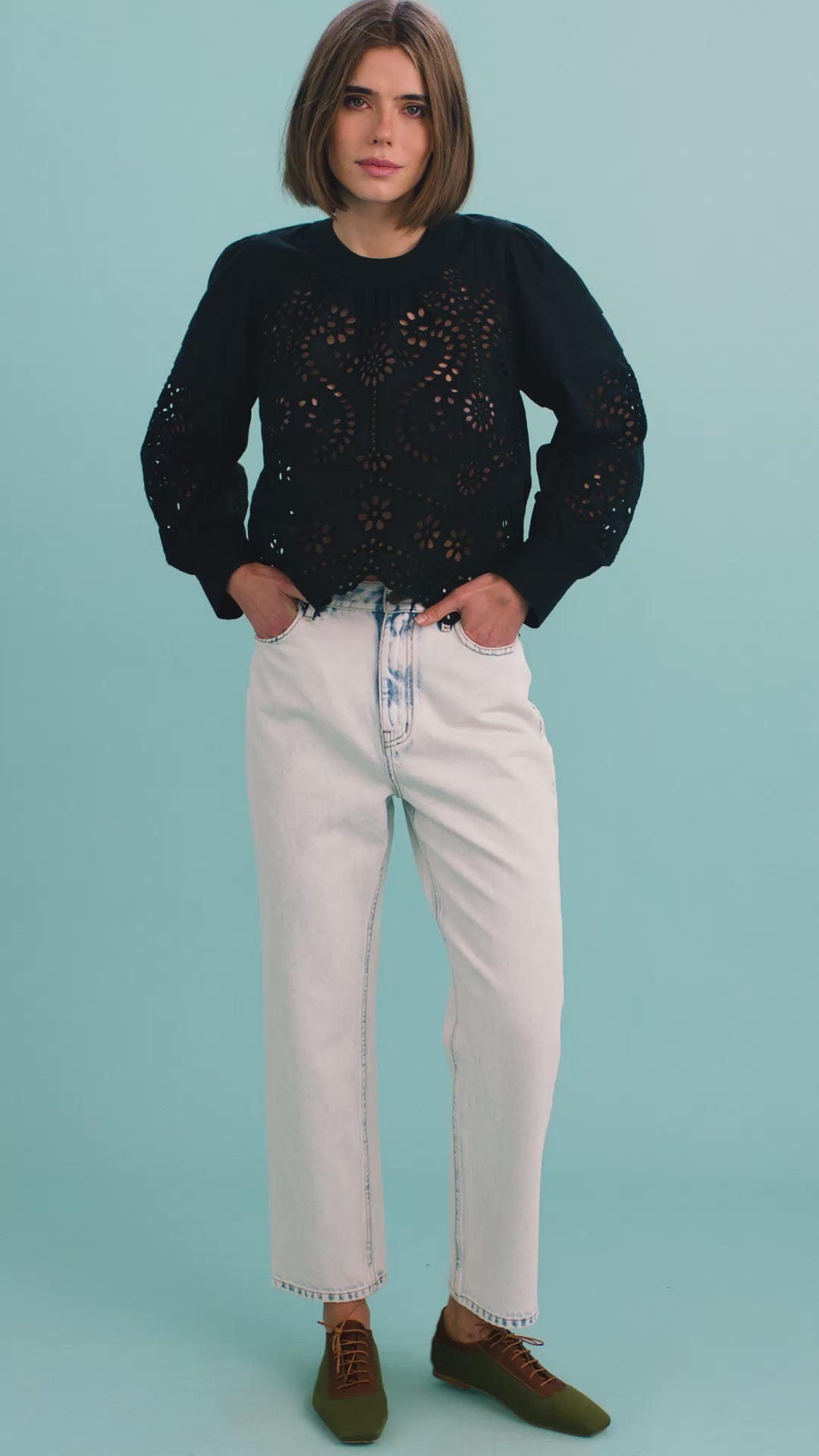 The Jennifer Top in Onyx paired with the Wray Pant in washed blue denim. 