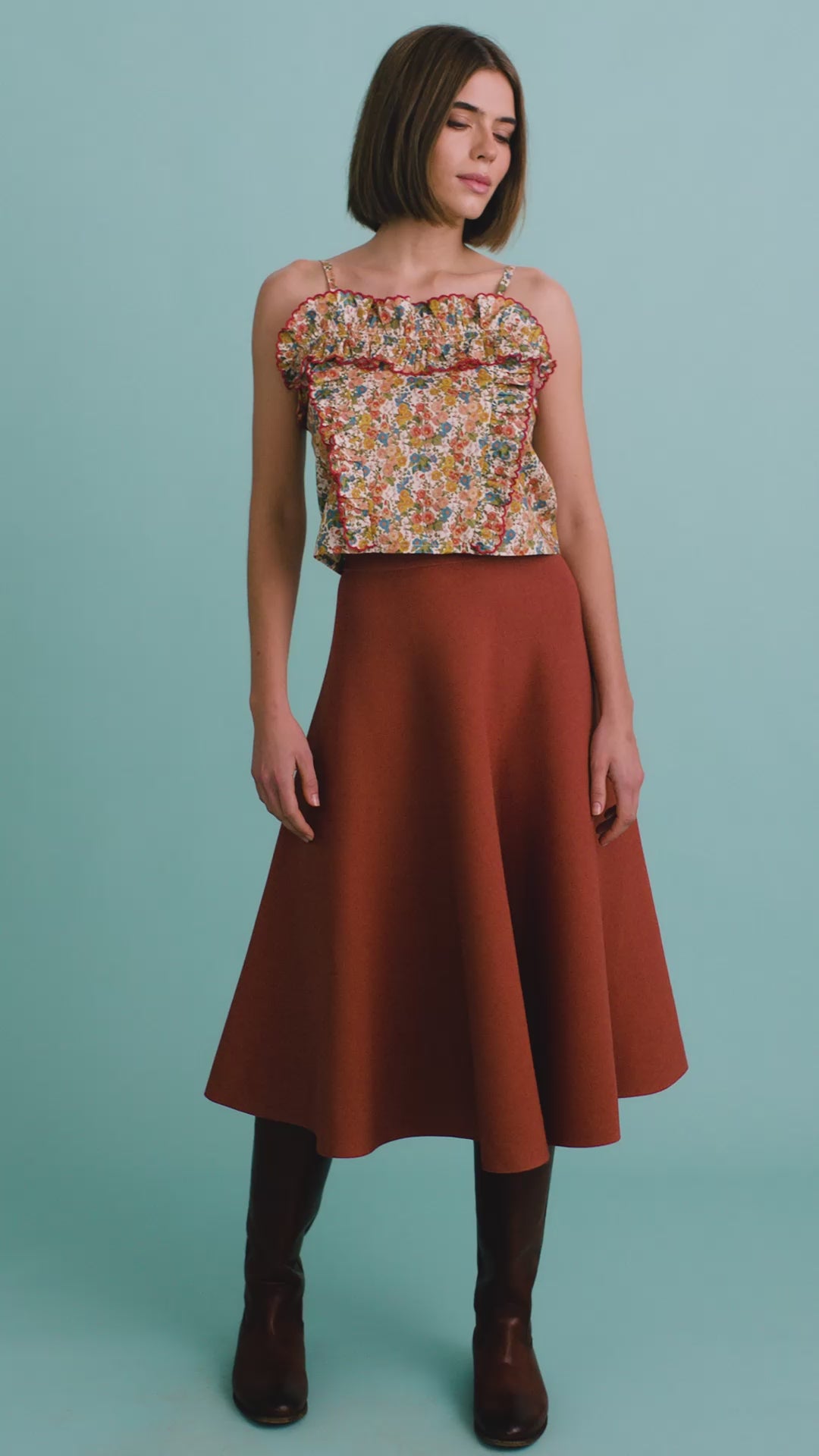 The Elwood Cami in Gertrude paired with the Joan Skirt in Rust. 