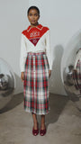 Ryder Sweater paired with the Harlan Skirt in plaid.