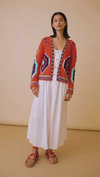 The best-selling Callen cardigan is a hand crocheted knit with long sleeves and an open front.
