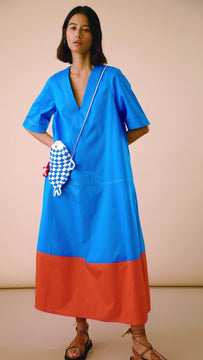 The Gigi color block dress is a v neck relaxed fit maxi with wide cut short sleeves and full skirt.