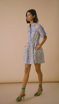 The Peyton Dress has a collared neckline, short sleeves, a drawcord waist and side seam pockets.