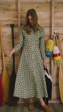 Midi dress with a clean crew neckline, modern dolman sleeves, with a circle-cut skirt.