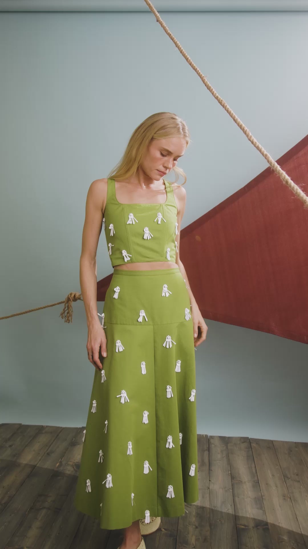 The Carissa Bustier in Palm Sand Dollars paired with matching Ida Skirt. 