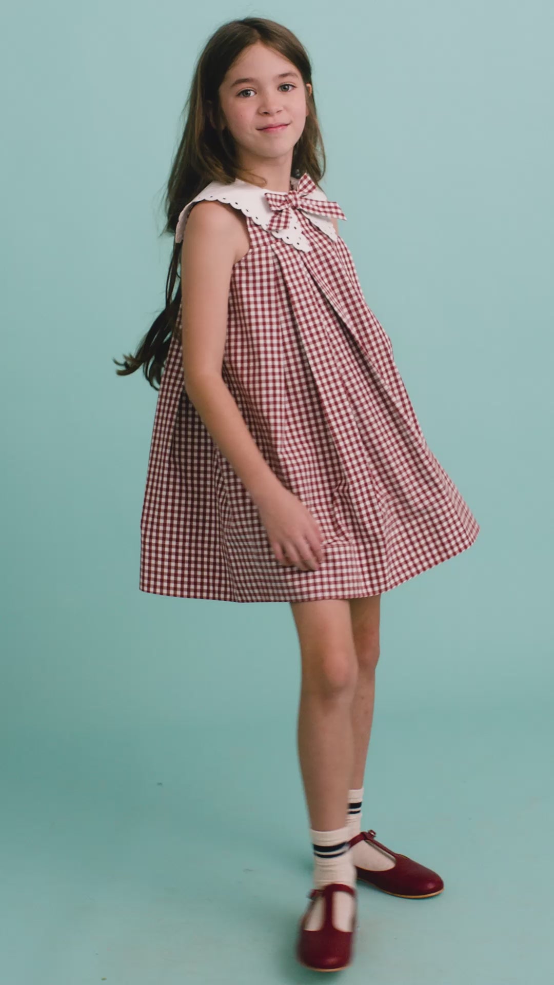 The Kids Marianne Dress in Cotswold Check Rust. 