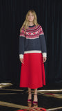 The Josie Sweater in St. Moritz Fair Isle has a ribbed crew neckline and long raglan sleeves.