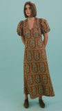The Harrison Dress in Amber Glen Brown. 