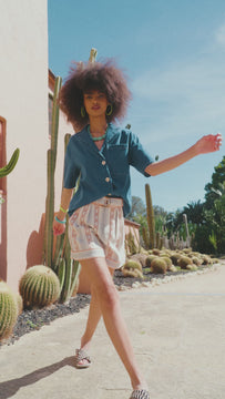 Hunter Bell Tyler shorts feature a high cinched waist, oversized D-ring belt, and a gingham trim.