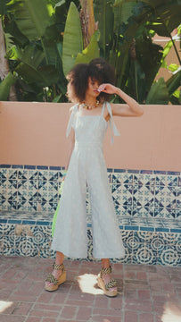 The Alex Jumpsuit is has a square neckline, a wide leg silhouette and adjustable self ties.