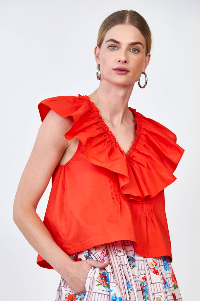 The Keller sleeveless top has a flutter design at the v neckline and a boxy, relaxed fit.